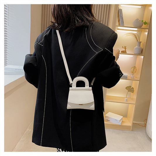 GlosséMini™ – Patent Leather Shine Bag